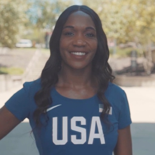 UC Alumna and Olympic athlete Mary Wineburg smiles for the camera